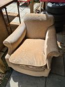 A Victorian style low armchair