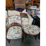 An early 20th Century mahogany armchair, having balustrade decoration and an oval stool on square le