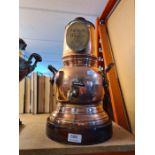 An old two handled copper urn, electrical for Irish Whisky