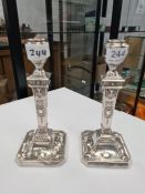 A highly decorative pair of Edwardian Adam style silver candlesticks of attractive style. Very prett