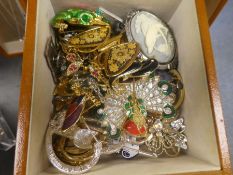 Jewellery box containing modern necklaces, chains, brooches, pendants, etc