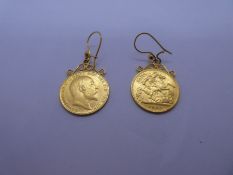 Pair of yellow metal drop earrings, each hung with half Sovereign dated 1902 and 1910, Edward VII an