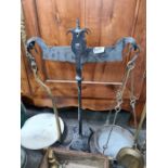 A collection of vintage items including oil lamp, scales, 2 inlaid shelves, etc