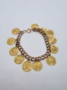 9ct yellow gold curb link bracelet hung with 12 charms depicting the 12 signs of the zodiac, each ch