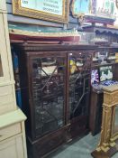 An old mahogany bookcase having Astragal glazed doors, with 2 drawers under