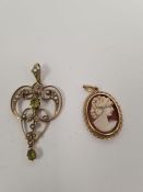 9ct yellow gold Art Nouveau design peridot and seed pearl pendant marked 9ct and a yellow metal oval