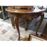 A Victorian mahogany prayer chair and a reproduction consul table