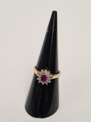 18ct yellow gold ruby and diamond chip cluster ring, marked 750, size L, maker T.A.D. weight approx