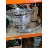 A large silver plated punch bowl with 6 cups and ladle, a large plated tray and a Soda syphon