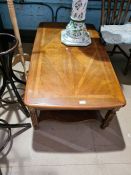 A reproduction oblong two tier coffee table