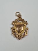 Antique 9ct yellow gold Sports medal with foliate decoration, maker HB & S, with engraving WLN, 8g a