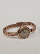 Antique 9ct yellow gold wristwatch with silvered dial, subsidiary seconds dial, marked 9ct on 9ct ye