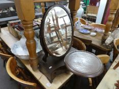 An antique box base dressing mirror having serpentine front and a reproduction Torchere