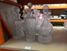 12 various glass decanters some being cut crystal
