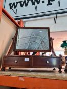 An antique mahogany bow fronted dressing mirror having two drawers