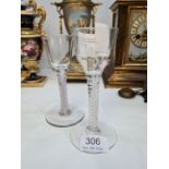 A Georgian 18th Century air twist wine glass with facet cut bowl. A decorative piece, 13.5cm approx