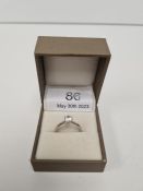9ct white gold solitaire ring set with a round cut white sapphire marked 375, Birmingham, maker R &