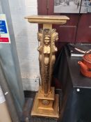 Pair of Art Deco gilded torchieres, each depicting four carved semi-nude maidens, raised on square p