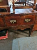 An old dresser base having 2 drawers on square legs, 130cm
