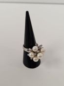 Contemporary 18ct white gold cluster ring set 6 pearls and diamonds, of floral form, marked 18K, siz