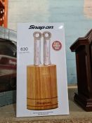 A Snap On wall clock and a Snap On six piece knife set
