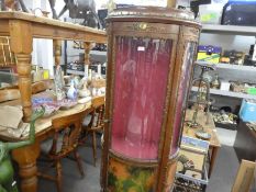A reproduction French style Vitrine having gilt metal decoration