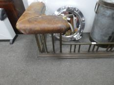 An old club fender having tatty leather upholstery, 130cm