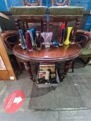 A late Victorian mahogany extending dining table having two leaves and a set of 6 balloon back chair