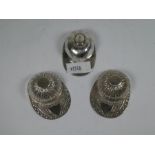 Of Racing Interest; a pair of novelty silver Jockey Cap caddy spoons. The cap and peak are embossed