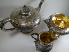 A Scottish silver tea service, heavily embossed, impressive Victorian Scottish silver tea service by