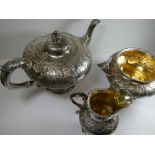 A Scottish silver tea service, heavily embossed, impressive Victorian Scottish silver tea service by