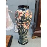 A modern Moorcroft vase decorated flowers. C2000, 20cm