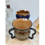 A Doulton Lambeth stoneware jug and a stoneware blue glaze jardinere