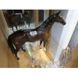 A large Beswick brown Stallion, Front leg broken / repaired