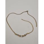 9ct yellow gold herringbone design necklace with two tone twisted panel suspended with diamonds appr