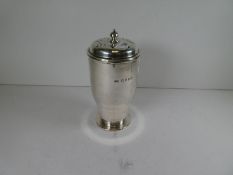 A Josiah Williams and Co silver sugar sifter hallmarked London 1935, with the Jubilee mark. The pier