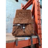 A post War Swiss military back pack, made from animal hide