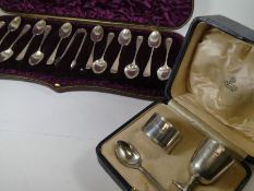 Asprey, a cased silver egg cup and napkin ring in its Asprey case, with a plated teaspoon. Hallmarke