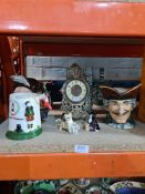 Three Royal Doulton character jugs, a brass easel clock and sundry