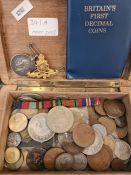 A World War I War Medal to Pte W. A. Anderson, Rifle Brigade, an R.A. Cap badge and small quantity o