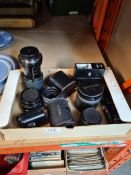 A small quantity of camera lenses and sundry