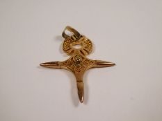 Unmarked yellow gold pendant of decorative cross design, unmarked approx 3g