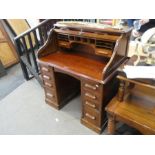 An old oak twin pedestal roll top desk, 105cm