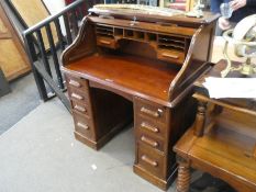 An old oak twin pedestal roll top desk, 105cm