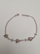 Clogau; a pretty silver and 9ct Clogau Gold bracelet with heart links, 18cm in Clogau gold box