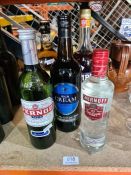 Five bottles of alcohol including Pernod and Campari