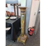 An unusual early 20th Century Egyptian revival glass and wood mounted column, the reverse painted gl