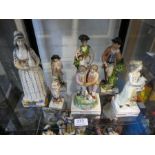 Seven antique Staffordshire figures of square bases