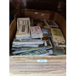 A tray of ephemera, mainly postcards