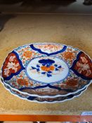 Two Japanese Imari oval dishes and six plates